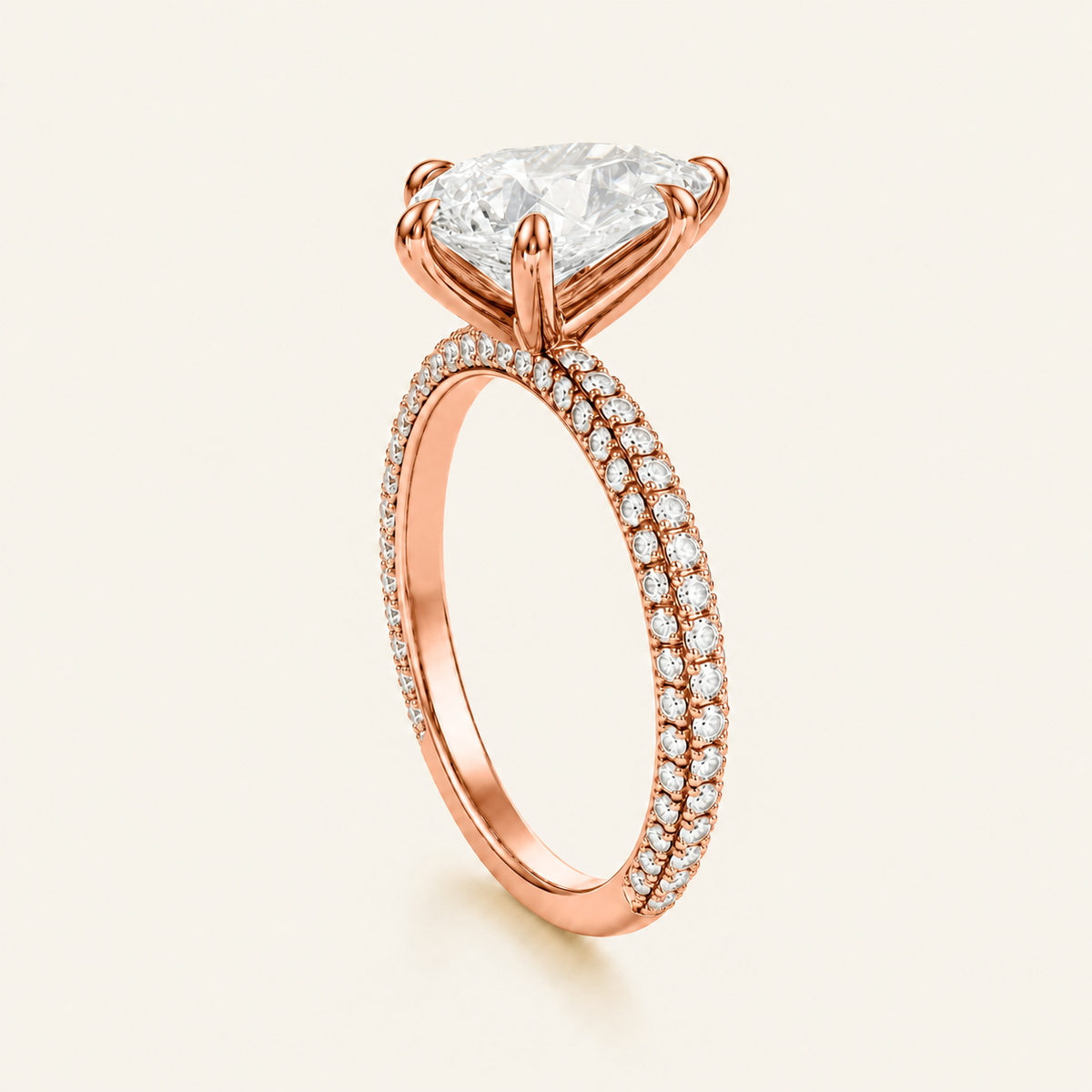Anillo Pavé Trío Diamante Pera en oro rosado, vista tres cuartos