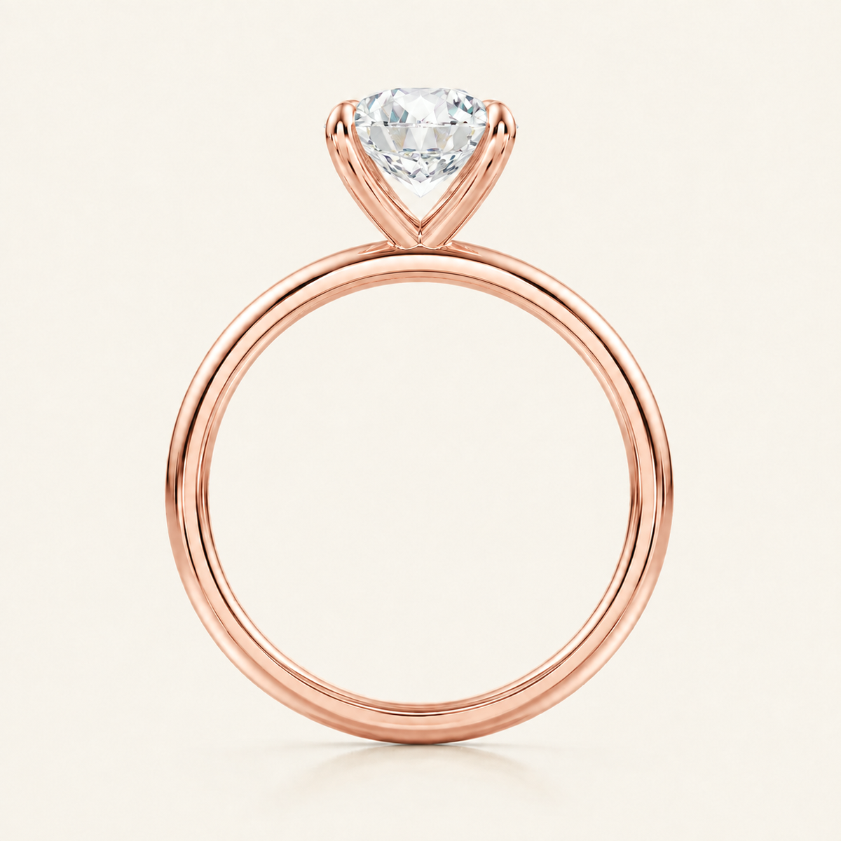 Anillo Solitario Clásico Diamante Redondo en oro rosado, vista de perfil