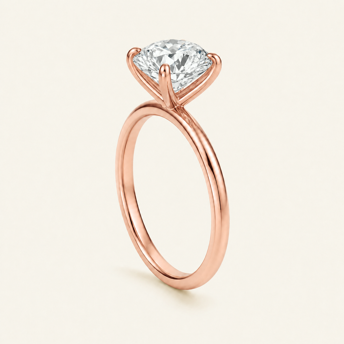 Anillo Solitario Clásico Diamante Redondo en oro rosado, vista tres cuartos